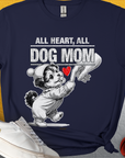 The navy t-shirt features a cartoon dog in pajamas holdin a womans hand with the saying All Heart, All Dog Mom. Designed by Dog Gang. Perfect for any dog lover or dog mom.
