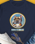 This dog-themed shirt features the playful text Beware of the Fake Dogs! with a cartoon cat with a picture of a dog's face in front of her face. Perfect for any dog lovers collection. Designed by Dog Gang.