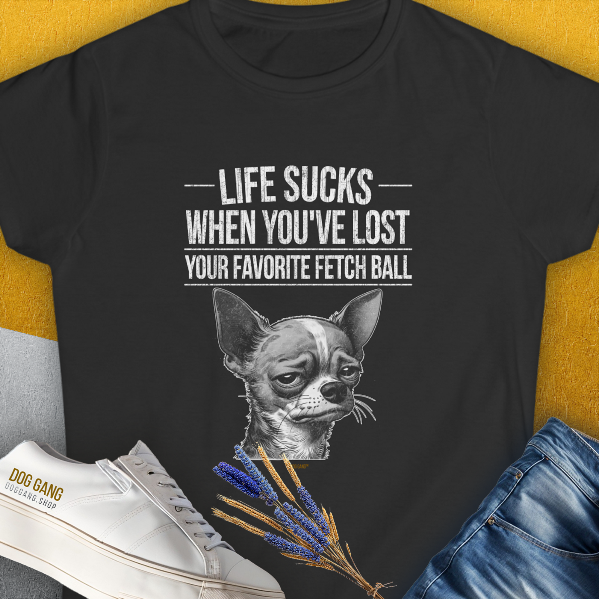 Sad dog  (Chihuahua) illustration and the text "Life Sucks When Youve Lost Your Favorite Fetch Ball" create a funny dog shirt perfect for any Chihuahua lover. Designed by Dog Gang.