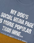 My Dogs Social Media Page Is More Popular Than Mine, Unisex T-Shirt-humorous dog lover / dog owner Design by Dog Gang