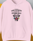 The My Dog Is Easily Distracted By - Volume 4: Other Dogs Fetching Balls hoodie showcases a funny dog illustration with the saying. Designed by Dog Gang.