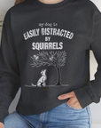 My Dog Is Easily Distracted By - Volume 1: Squirrels, Unisex Sweatshirt-, Design by Dog Gang