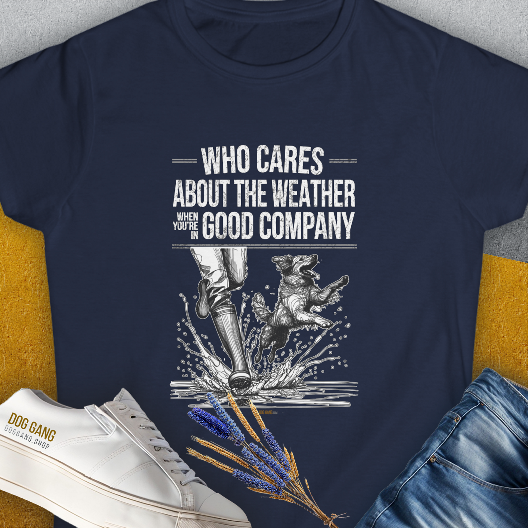 The womens T-Shirt Who Cares About The Weather When Youre In Good Company, Volume 1 features a joyful person and dog running through puddles. Ideal for any dog lover. Designed by Dog Gang.