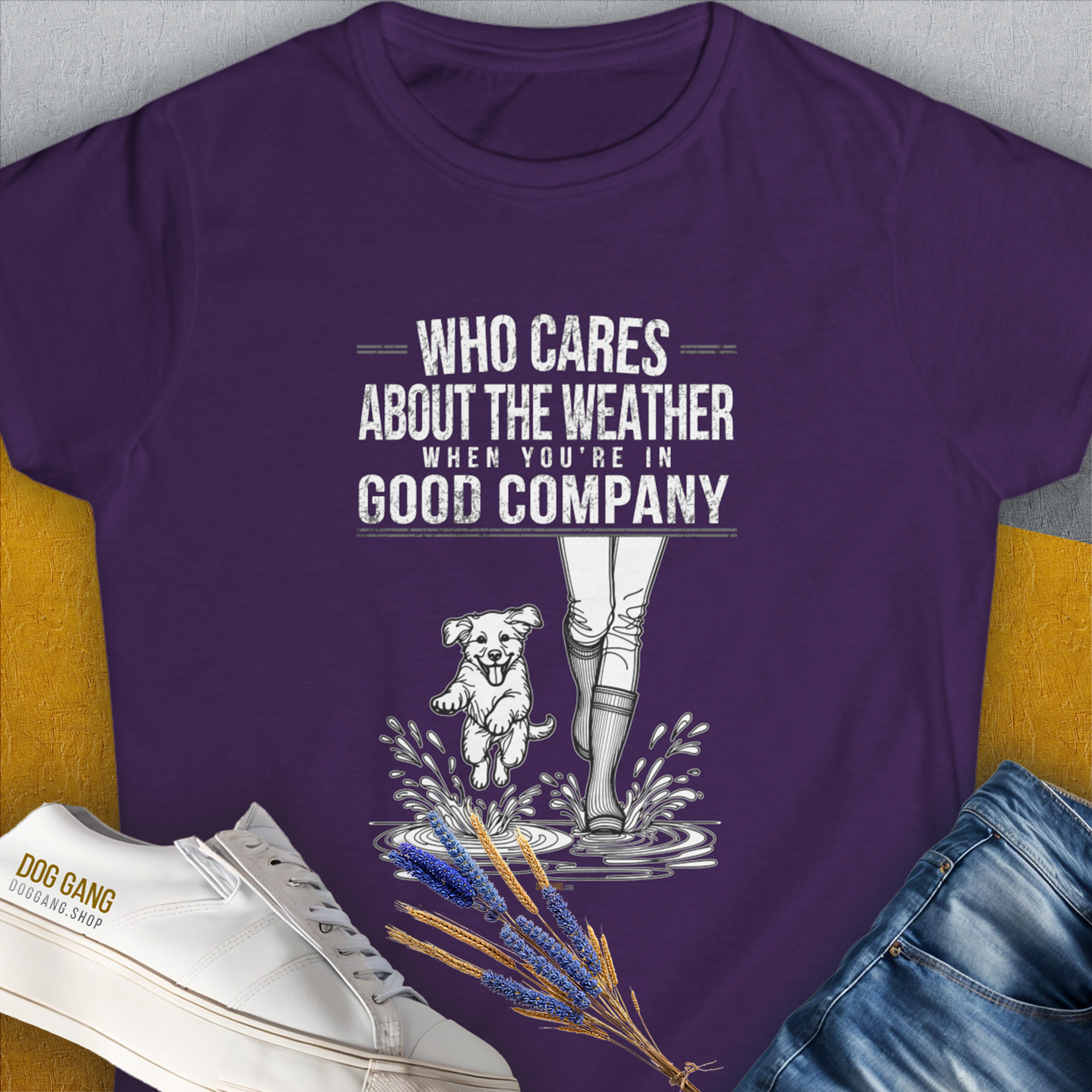 Who Cares About The Weather features a dog and boots graphic. A cute dog design perfect for any dog lover. Designed by Dog Gang.