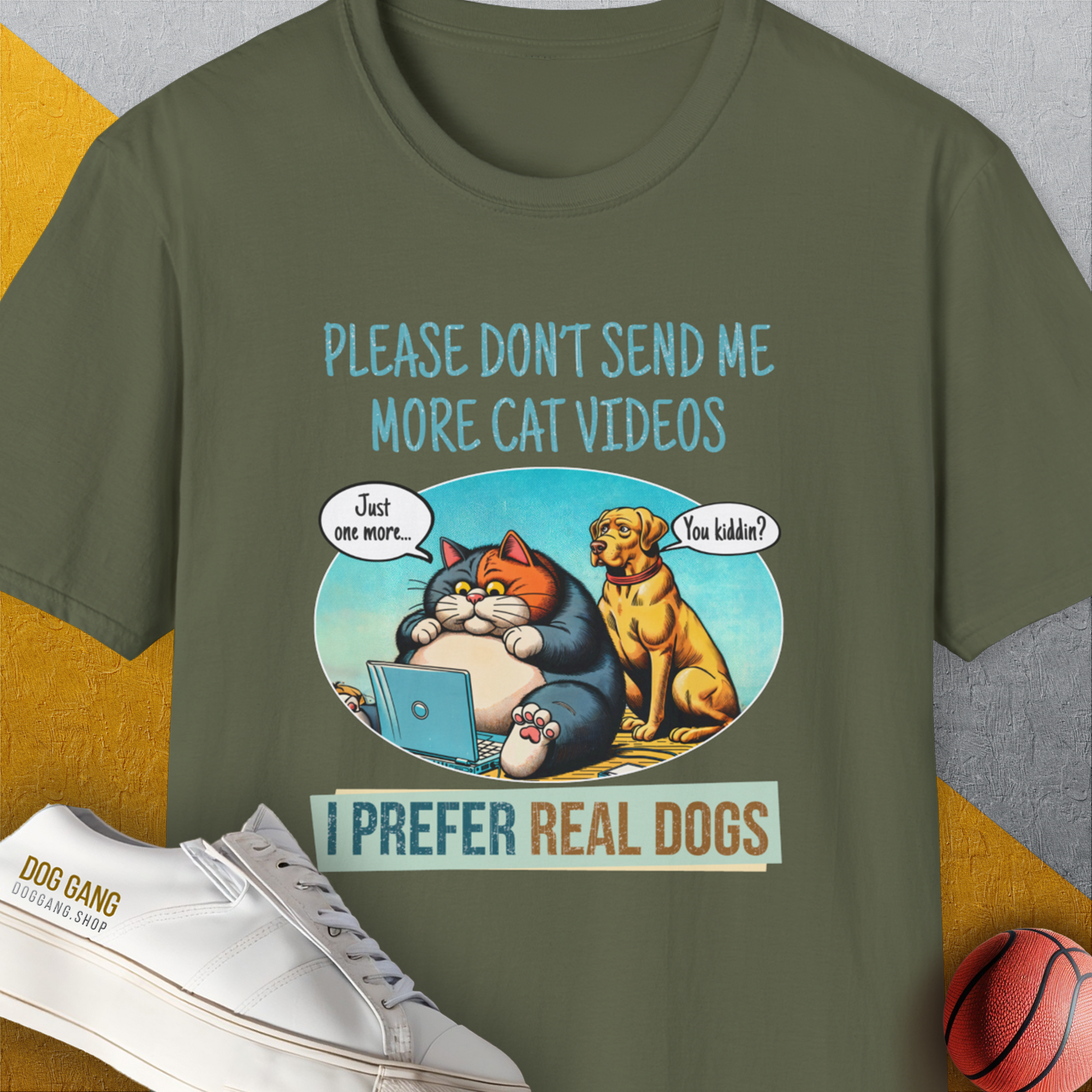 Unisex T-Shirt with cartoon cat and dog on a laptop. Text: Please dont send me more cat videos. I prefer real dogs. A funny shirt for any dog person. Comes in military green. Designed by Dog Gang.
