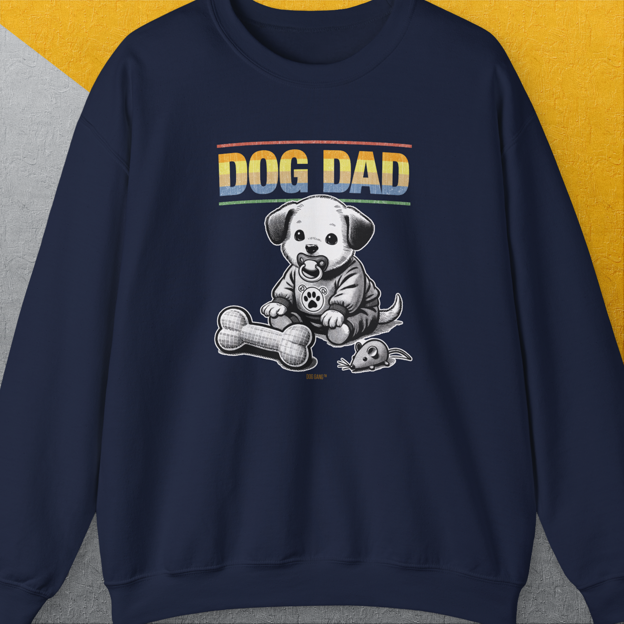 Dog Dad with a cute cartoon puppy, fabric bone, and mouse toy graphics. Perfect for any dog owner proud to show off their canine connection. Designed by Dog Gang.