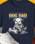 "Dog Dad" - Tee. Cartoon puppy with a fabric bone and a fabric mouse as a toy. Perfect for any dog lover or dog owner. Designed by Dog Gang.