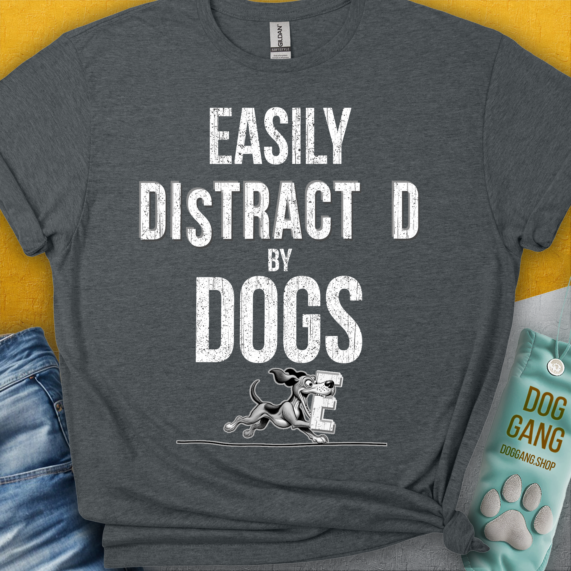Easily Distracted by Dogs Series, Volume 3 features a cute dog design with the saying Easily Distracted by Dogs in bold. Perfect for any dog lover. Designed by Dog Gang.