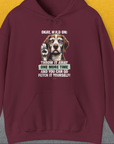 The Go Fetch It Yourself Series, Volume 3, Unisex Hoodie features a playful dog graphic with Throw it away one more time and you can go fetch it yourself! on maroon fabric. Perfect for the funny dog person. Designed by Dog Gang.