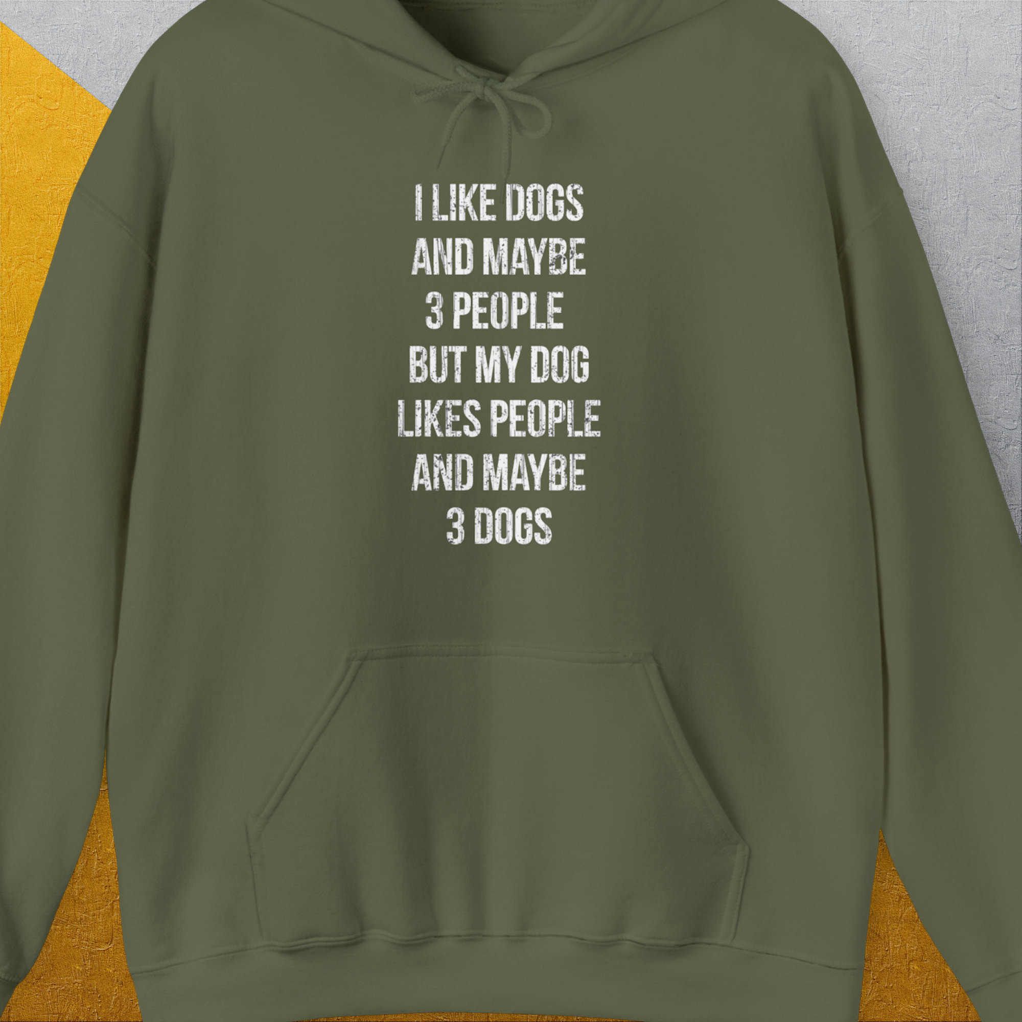 This military green unisex hoodie features a funny quote: I like dogs and maybe 3 people but my dog likes people and maybe 3 dogs. Ideal for any dog person. Designed by Dog Gang.