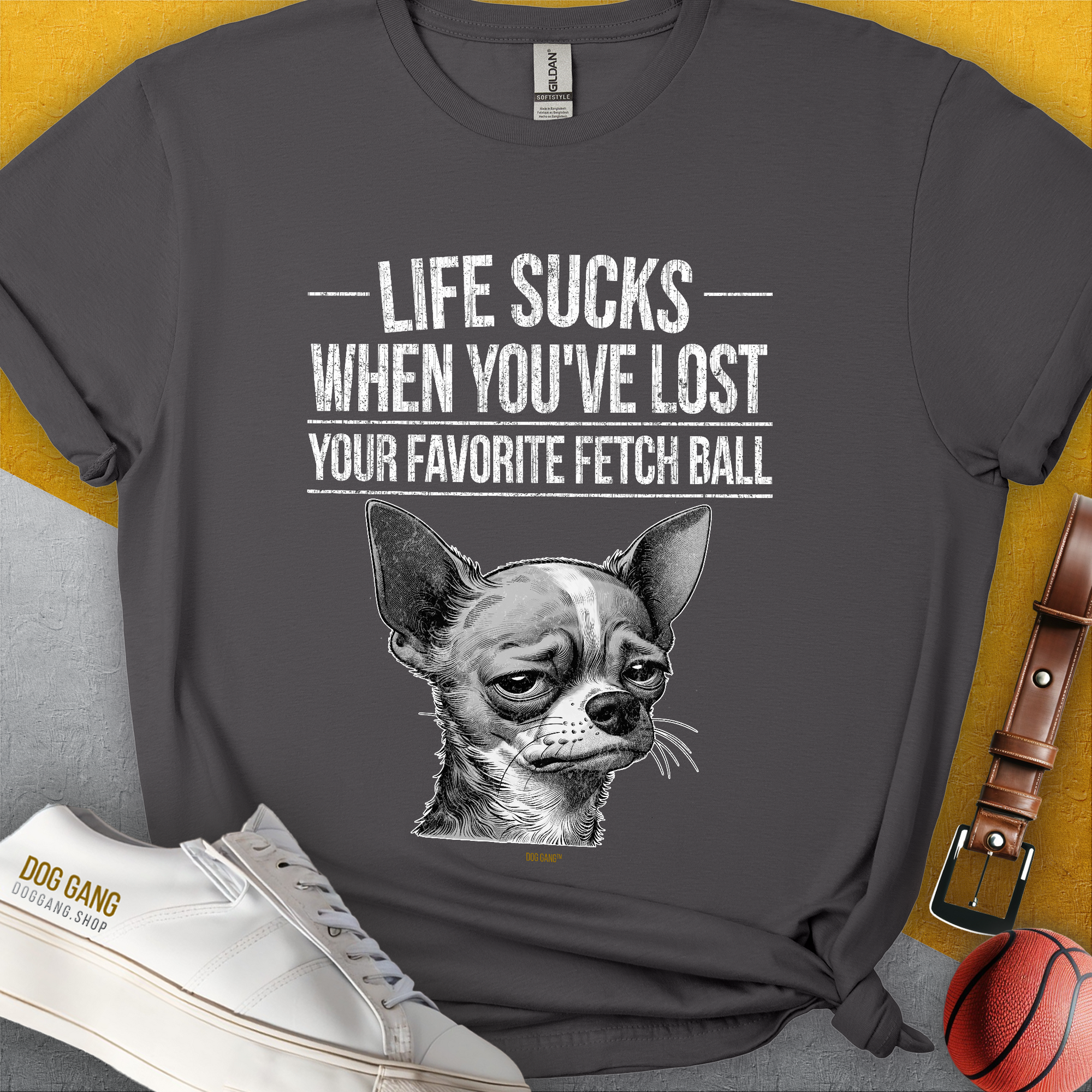 Unisex T-shirt titled Life Sucks When Youve Lost Your Favorite Fetch Ball, Volume 6 featuring a sad Chihuahua  face and text. Perfect Chihuahua-themed wear for any occasion. Designed by Dog Gang.