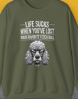 The military green sweatshirt showcases a cute poodle illustration with the funny saying, Life Sucks When Youve Lost Your Favorite Fetch Ball, Volume 7. Designed by Dog Gang.