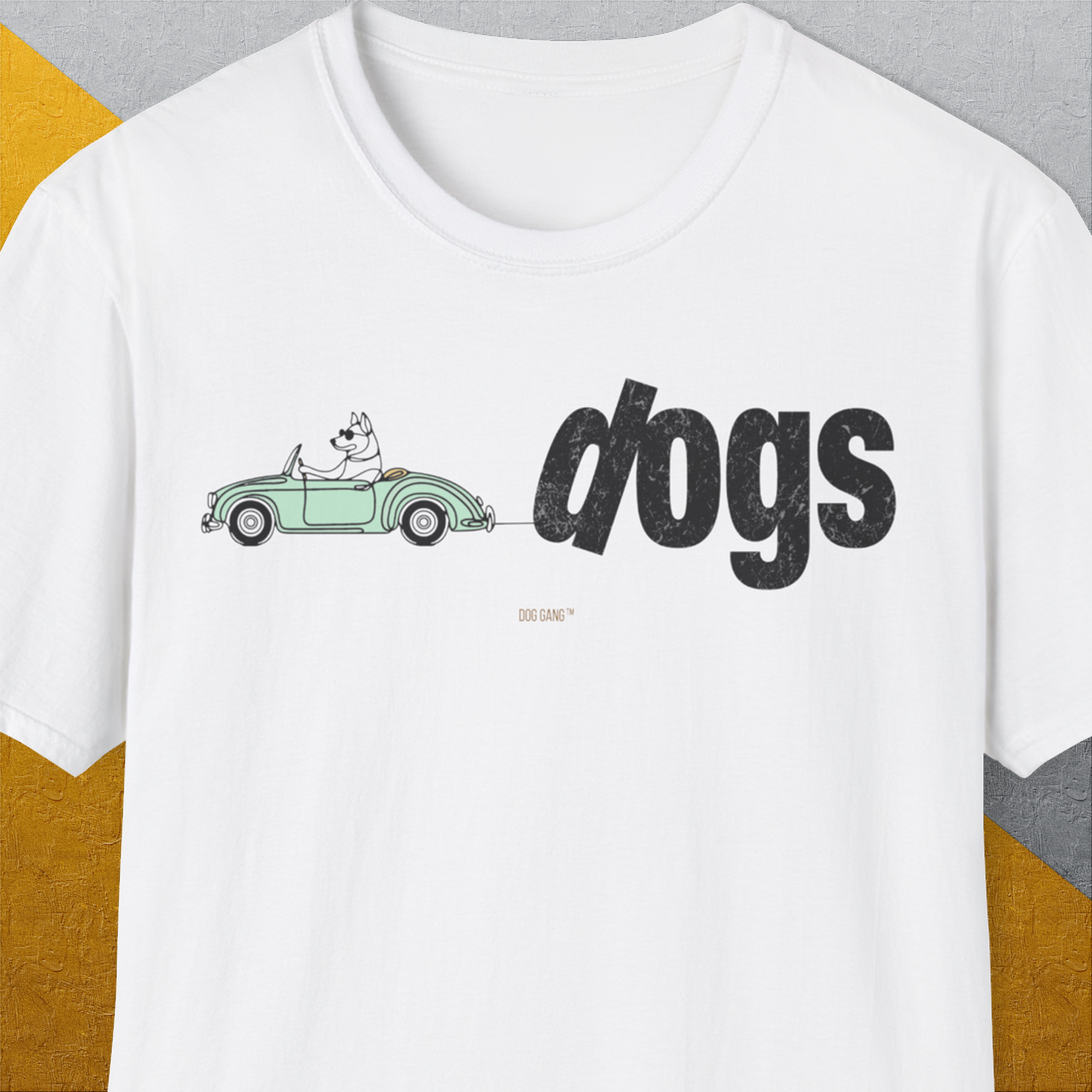 The Dog Gang Minimalistic Series II, Volume 2 Unisex T-Shirt showcases a funny cartoon dog in a green car with dogs in bold black letters. Designed by Dog Gang.
