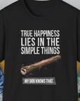 The True Happiness Series One, Volume 2 Unisex T-Shirt is black with a comfy cotton-polyester mix. It has the saying: True happiness lies in the simple things. My dog knows that. plus a simple wooden stick image. Designed by Dog Gang.