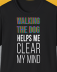The Walking The Dog Series One, Volume 3 T-shirt showcases the phrase Walking the dog helps me clear my mind in vibrant hues. Ideal for any dog lover gift. Designed by Dog Gang.