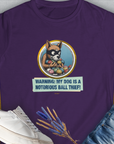 Warning: My Dog Is A Notorious Ball Thief, Volume 1, Women's T-Shirt-Purple. A perfect gift for dog lovers and dog owners. Design by Dog Gang