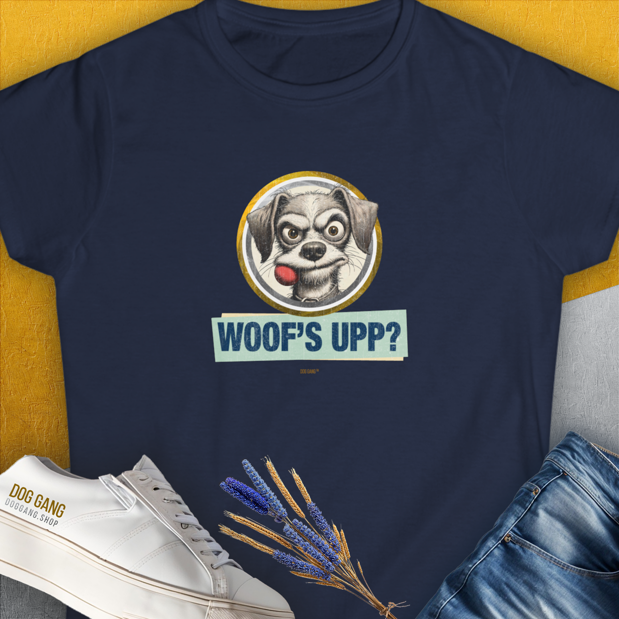 The Woofs Upp? Volume 1 Womens T-Shirt features a cartoon dog with the saying Woofs Upp? in a playful design, perfect for any dog lover. Designed by Dog Gang.