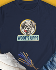 The Woofs Upp? Volume 1 Womens T-Shirt features a cartoon dog with the saying Woofs Upp? in a playful design, perfect for any dog lover. Designed by Dog Gang.