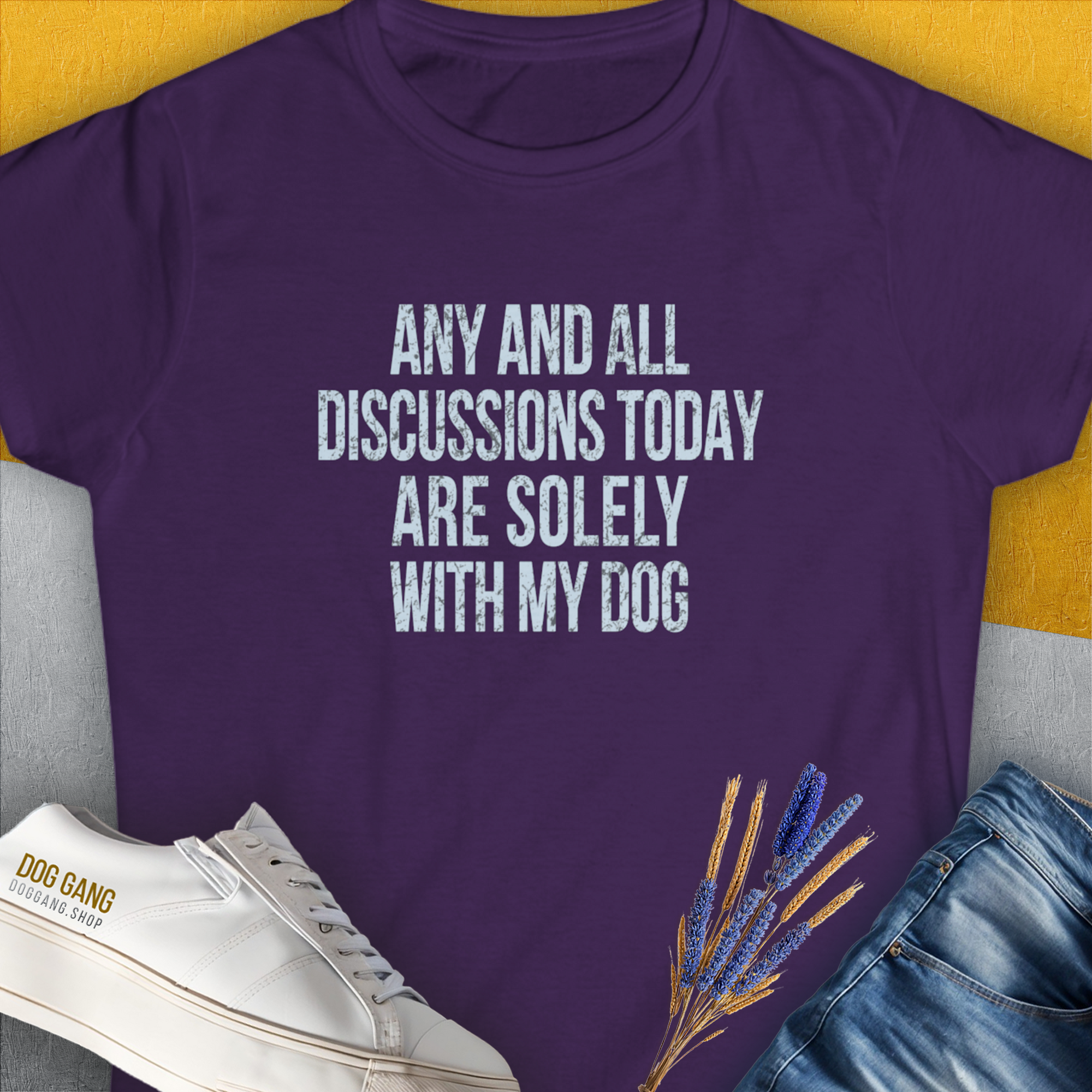 The design features playful text about conversing with your dog, perfect for any dog owner. Crafted from 100% ringspun cotton. Designed by Dog Gang.