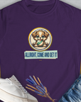 The purple womens T-shirt features a cute cartoon puppy with the text Allright Come And Get It, Volume 4. A perfect choice for a dog lover gift. Designed by Dog Gang.