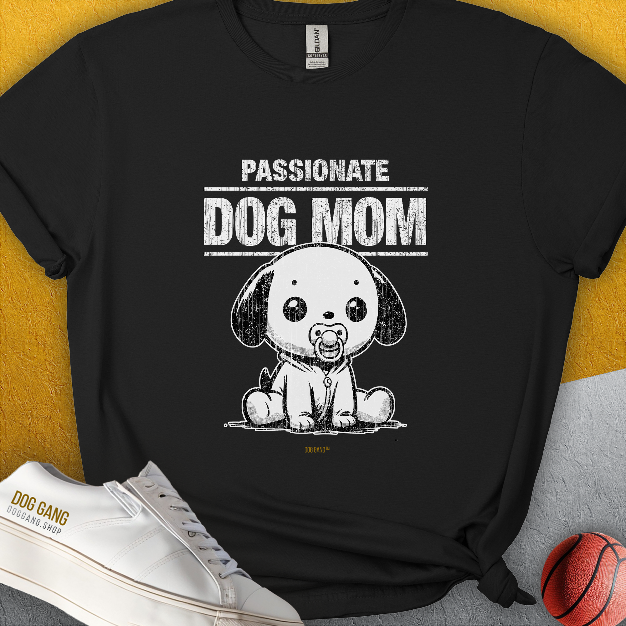 The Dog Mom Series, Volume 7 Unisex T-Shirt features a black soft-style design with Passionate Dog Mom text and a cute dog graphic for every passionate dog person. Designed by Dog Gang.