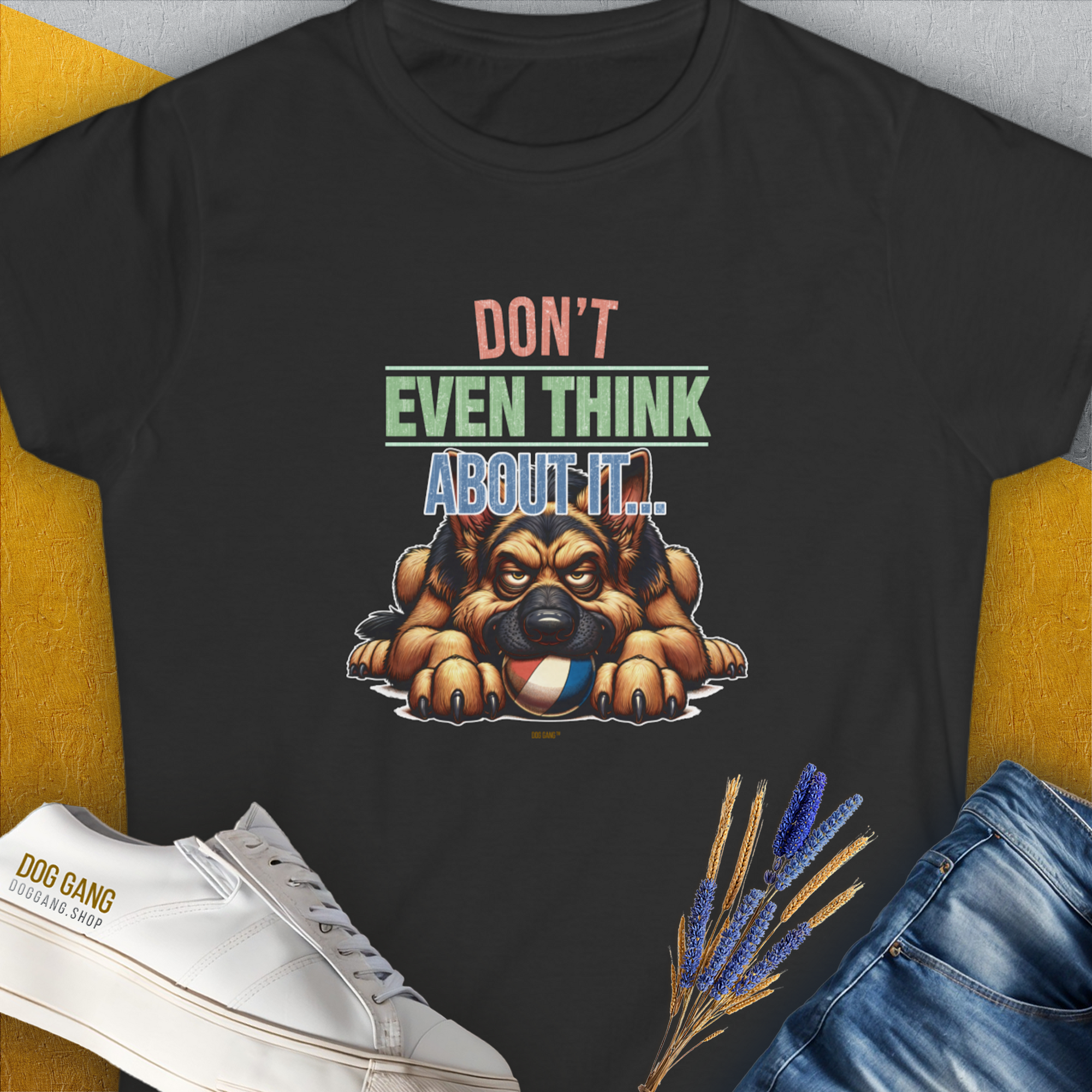 This t-shirt features a grumpy German Shepherd guarding his fetch ball with the bold text "Dont Even Think About It...", Volume 4 from the popular series of the same name. A funny dog shirt designed by Dog Gang.
