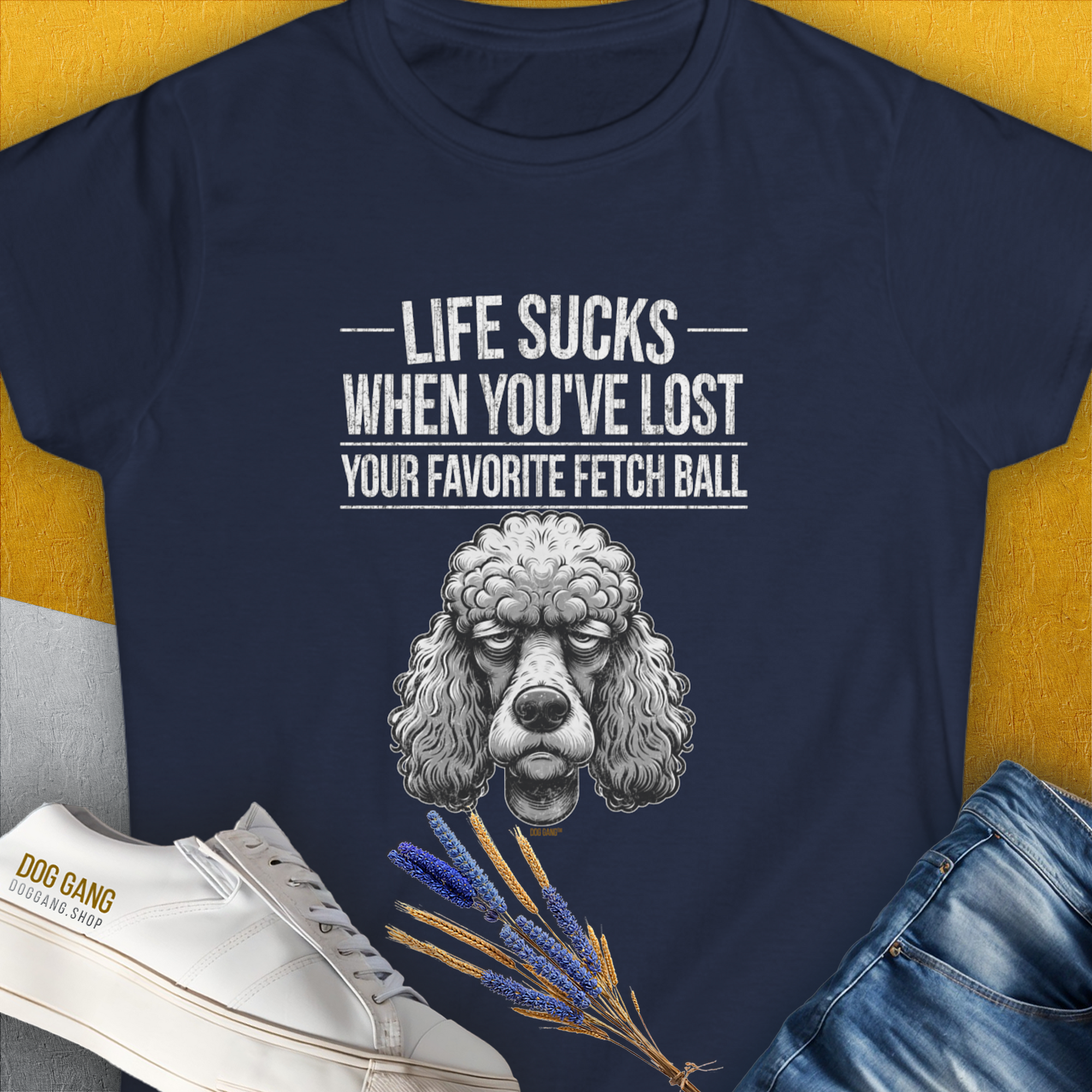 Womens navy shirt features a poodle illustration with the text Life Sucks When Youve Lost Your Favorite Fetch Ball, Volume 7. Its a funny dog-themed design for every dog lover. Designed by Dog Gang.