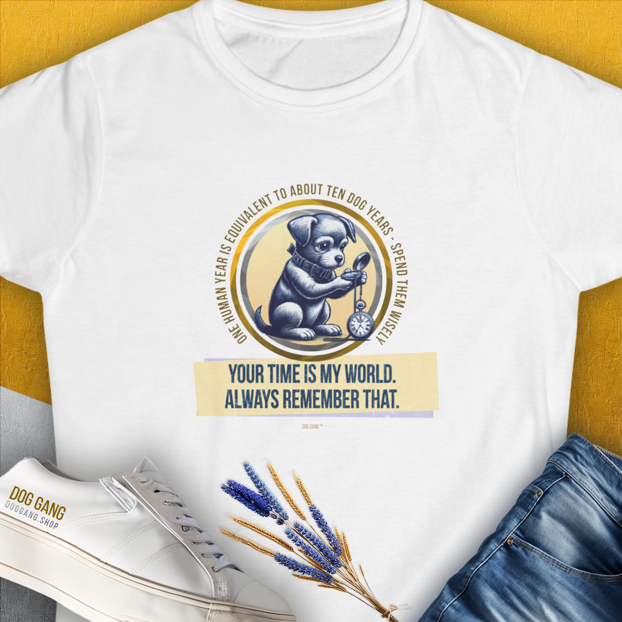 The One Human Year = Ten Dog Years, Volume 2 womens T-shirt in white features a funny dog design with a puppy and clock, highlighted by the quote: Your time is my world. Always remember that. Designed by Dog Gang.