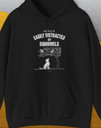 My Dog Is Easily Distracted By - Volume 1: Squirrels, Unisex Hoodie-Black, Design by Dog Gang