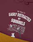 My Dog Is Easily Distracted By - Volume 1: Squirrels, Unisex Hoodie-. A dog-themed Design from Dog Gang