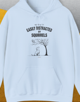 My Dog Is Easily Distracted By - Volume 1: Squirrels, Unisex Hoodie-Light Blue, Design by Dog Gang