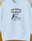 My Dog Is Easily Distracted By - Volume 2: Cats And Stuff, Unisex Hoodie-Light Blue, Design by Dog Gang
