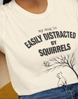 My Dog Is Easily Distracted By - Volume 1: Squirrels, Unisex T-Shirt-, a fun and stylish design for dog lovers from Dog Gang