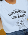 My Dog Is Easily Distracted By - Volume 3: Love And Hugs, Unisex T-Shirt-, a fun and stylish design for dog lovers from Dog Gang