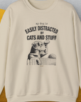 My Dog Is Easily Distracted By - Volume 2: Cats And Stuff, Unisex Sweatshirt-Sand. A perfect gift for dog lovers and dog owners. Design by Dog Gang