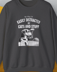 My Dog Is Easily Distracted By - Volume 2: Cats And Stuff sweatshirt has a playful dog illustration, perfect for any dog person. Designed by Dog Gang.