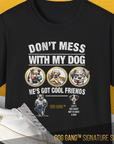 A black Dog Gang™ Signature Series, Volume 2 Unisex T-Shirt in soft Baumwolle features “DONT MESS WITH MY DOG HES GOT COOL FRIENDS” above cartoons of three dogs, with DOG GANG™ SIGNATURE SERIES at the bottom.