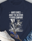 The womens T-Shirt Who Cares About The Weather When Youre In Good Company, Volume 1 features a joyful person and dog running through puddles. Ideal for any dog lover. Designed by Dog Gang.