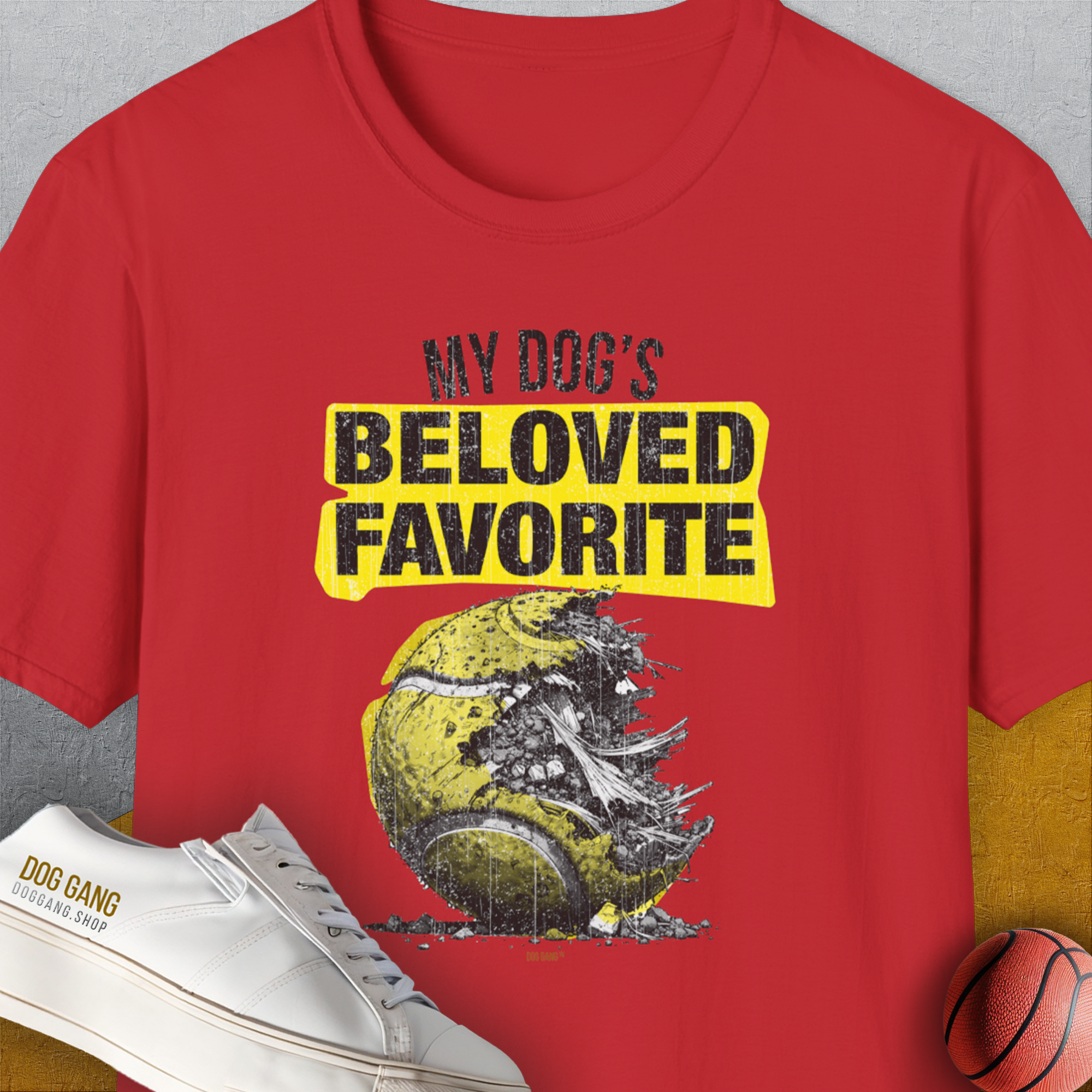 This funny dog shirt features a playful torn tennis ball design with the saying My Dogs Beloved Favorite for dog lovers. Designed by Dog Gang.