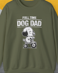 Unisex Sweatshirt in Military Green features a cartoon dog on a tricycle with the text Full Time Dog Dad on gray and yellow. Perfect for any dog lover. Designed by Dog Gang.