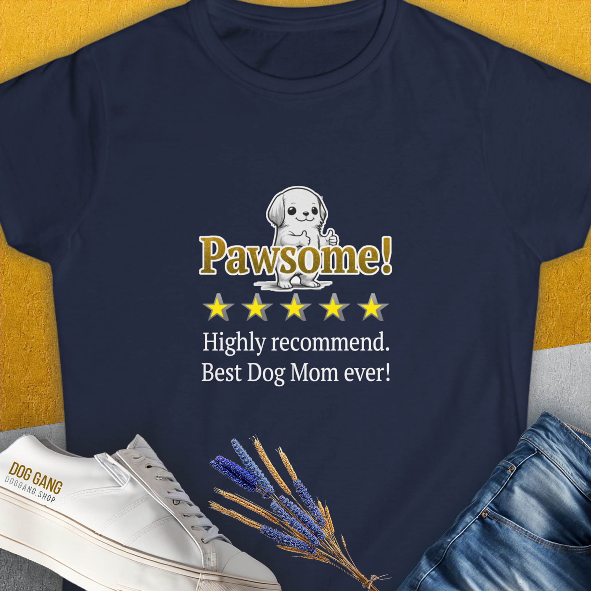 This navy tee features a playful cartoon dog print with Pawsome! and five stars, saying Highly recommend. Best Dog Mom ever! Perfect for any dog lover. Designed by Dog Gang.