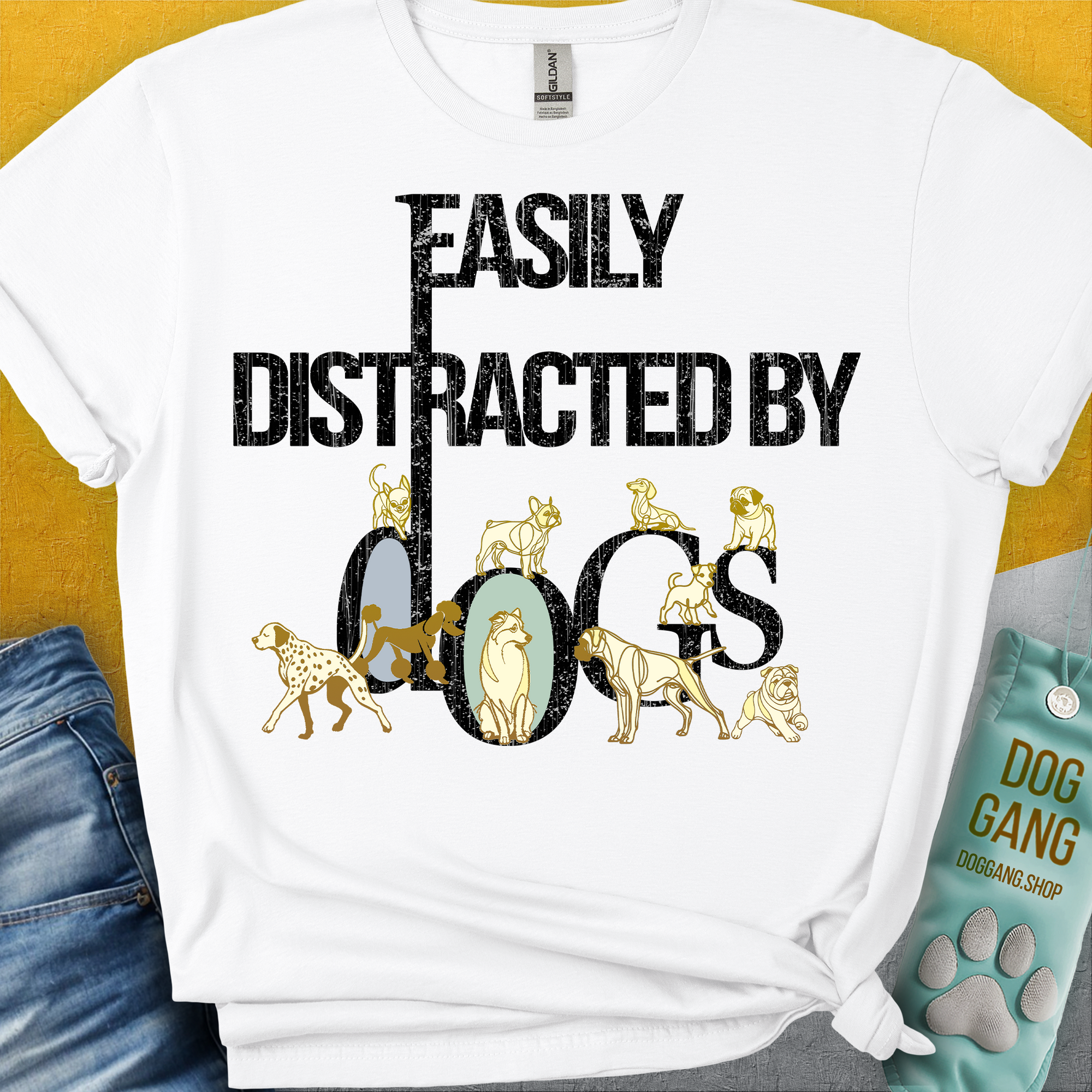The Easily Distracted By Dogs Series, Volume 1, Unisex T-Shirt is a soft white tee made from 100% cotton. It features the phrase with dog breed illustrations: a Dalmatian, a Golden Retriever, a Pug, a Poodle, Dachshund, French Bulldog, Chihuahua, Husky and more. Designed in Switzerland by Dog Gang.