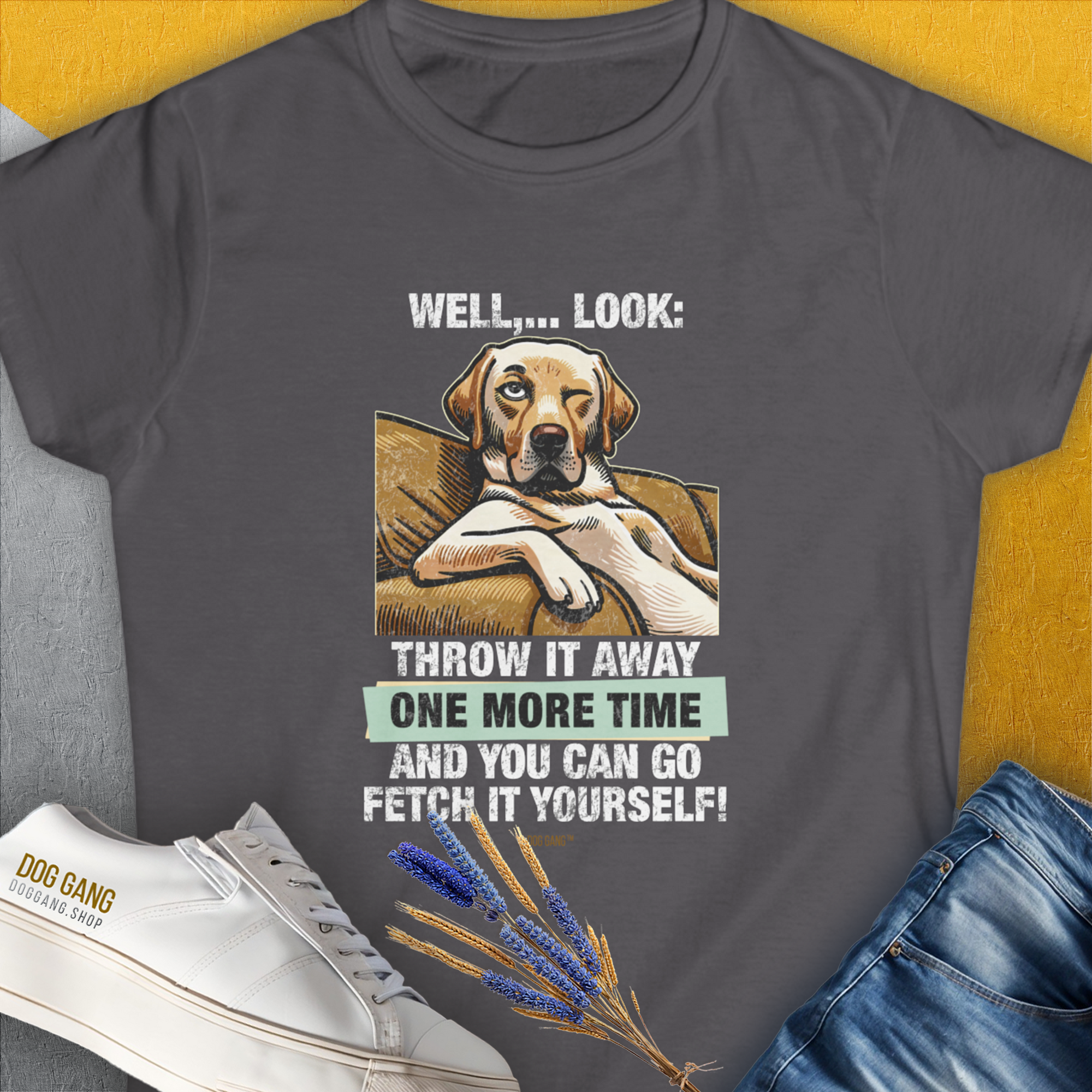 The Go Fetch It Yourself Series, Volume 1 tee features a relaxed Golden Retriever illustration with the witty quote: "Well,... Look: Throw it away one more time and you can go fetch it yourself!" Designed by Dog Gang.