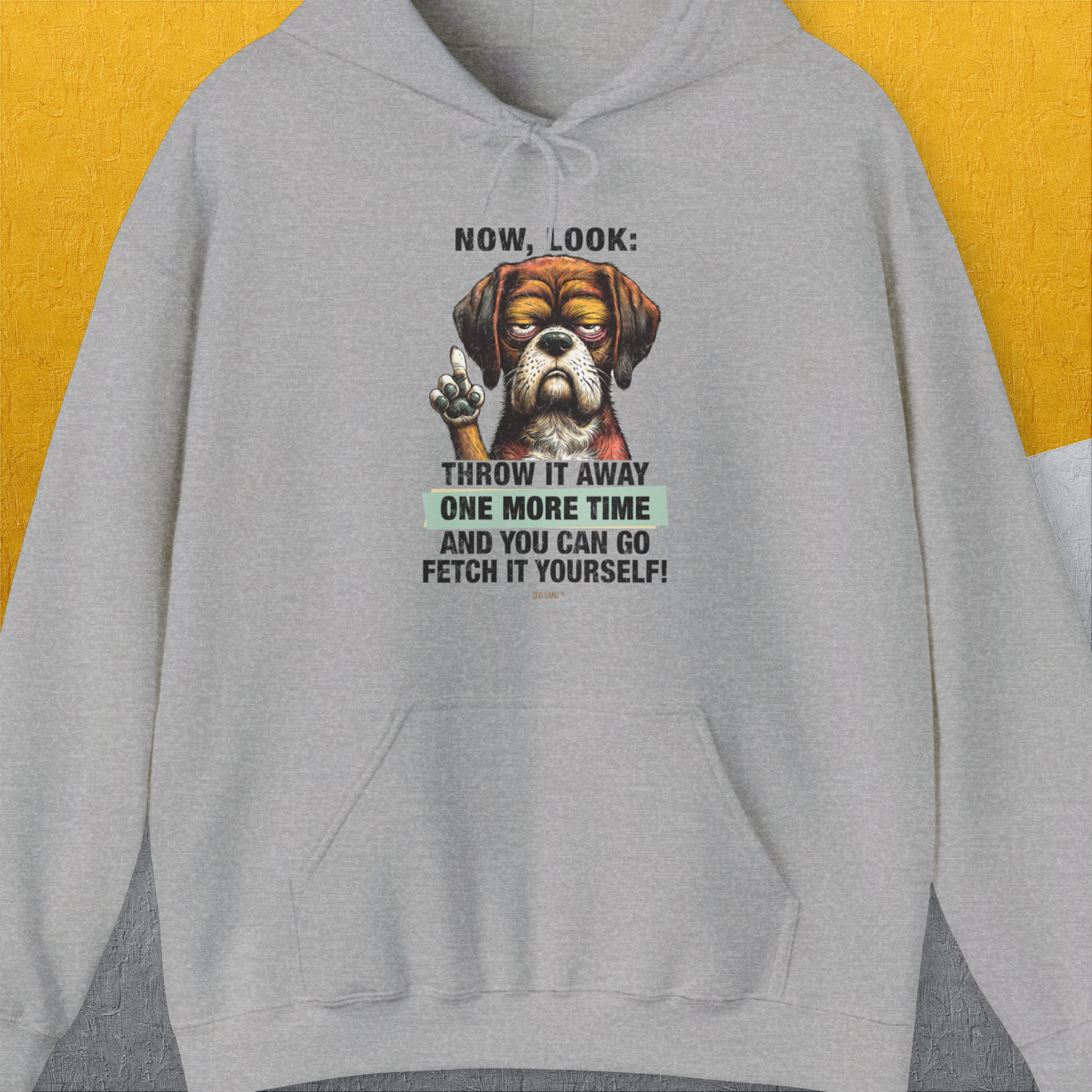 The Go Fetch It Yourself Series, Volume 2 Unisex Hoodie in Sport Grey features a funny dog design with the quote: Throw it away one more time and you can go fetch it yourself! Designed by Dog Gang.