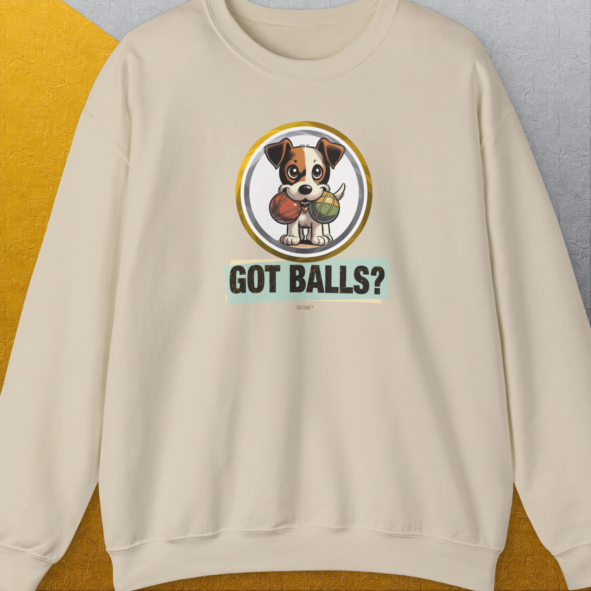 Cartoon dog with two fetch balls in his mouth and playful &quot;Got Balls?&quot; text adds humor to this dog-themed design. Designed by Dog Gang.