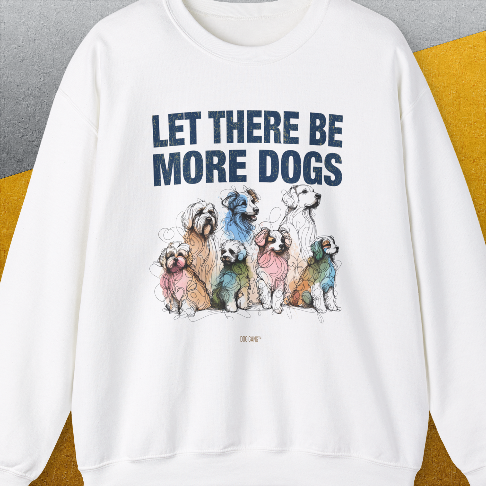 White Let There Be More Dogs unisex sweatshirt, featuring vibrant dog breed illustrations. Crafted from ethically grown cotton. Perfect for dog lovers. Designed by Dog Gang.