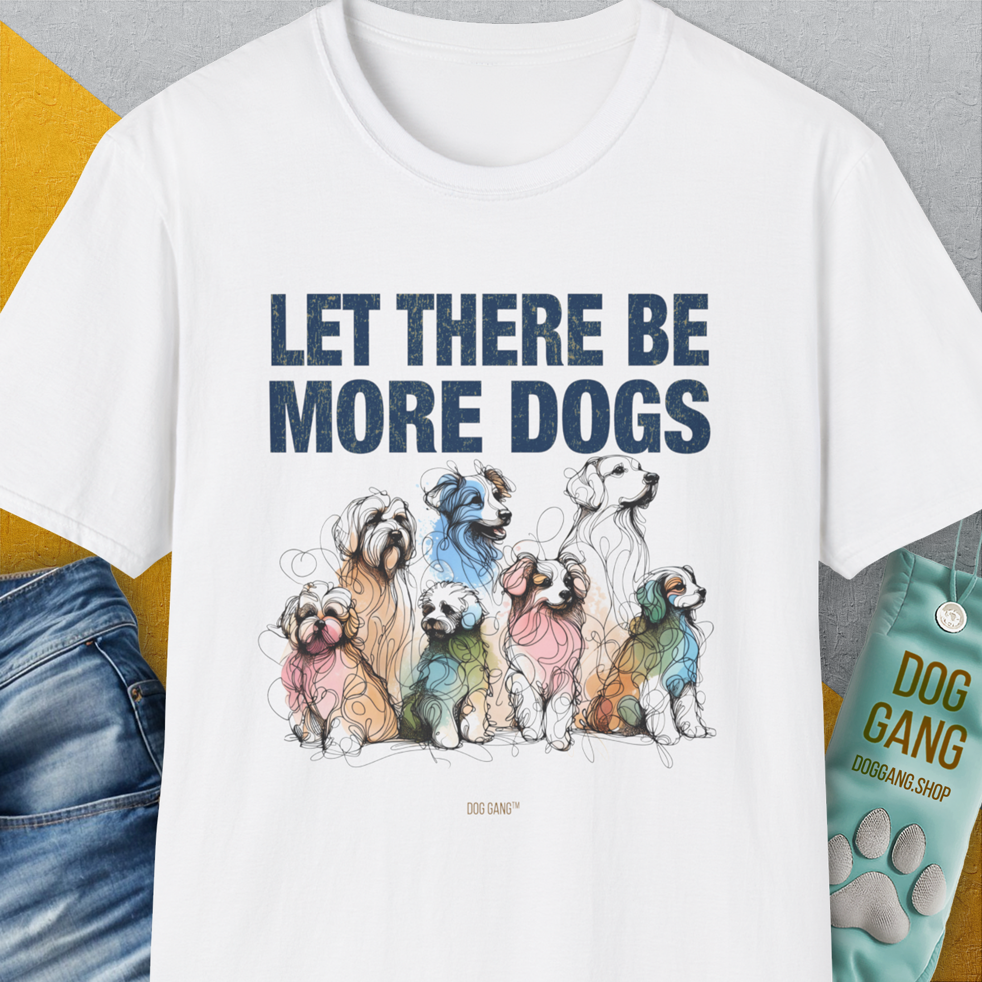 Unisex T-shirt, Let There Be More Dogs, in white, crafted from a soft-style cotton polyester blend with colorful dog-themed designs. Designed by Dog Gang.