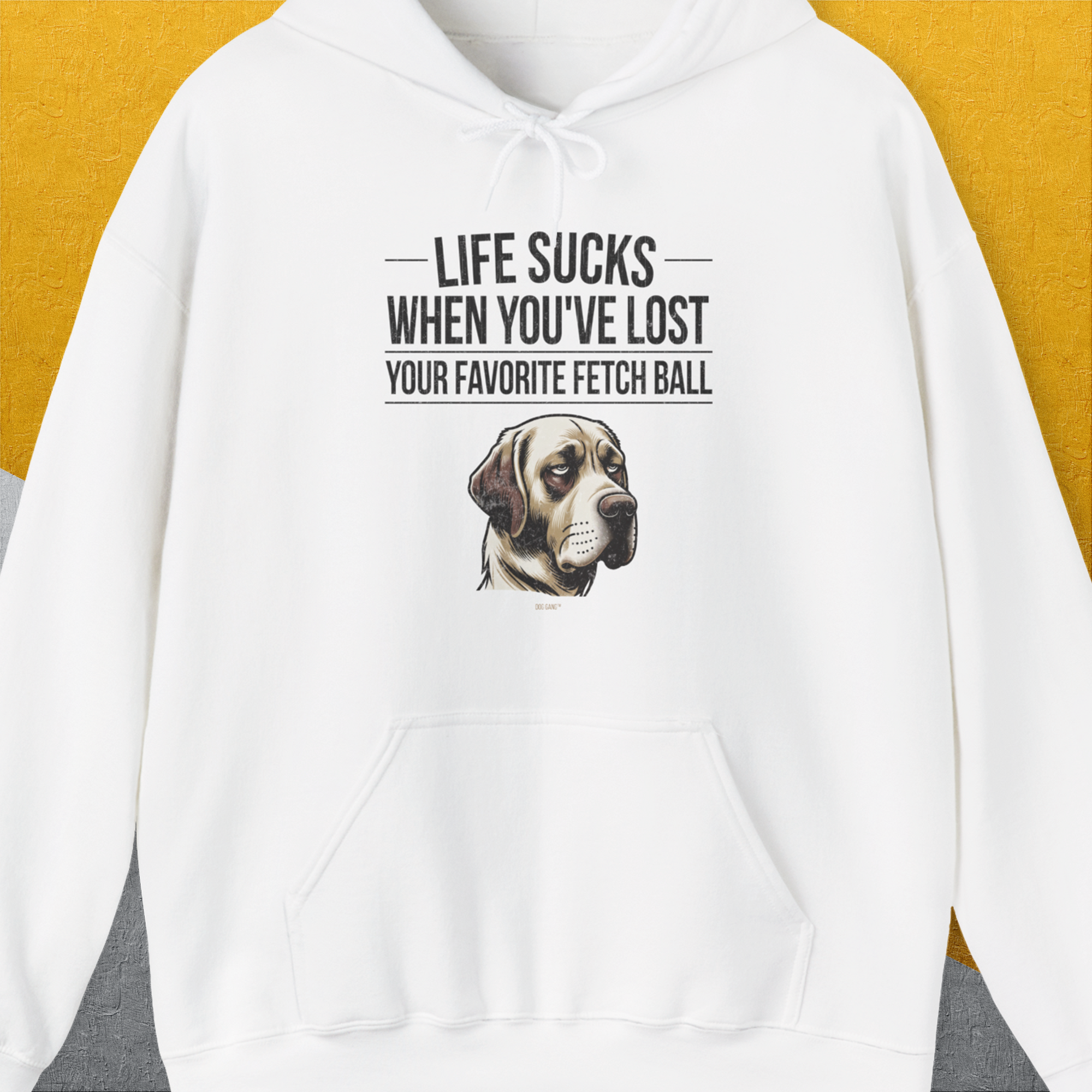 The shirt features a funny dog design with the saying, Life Sucks When Youve Lost Your Favorite Fetch Ball, Volume 1, and a cute illustration of a sad dog. Designed by Dog Gang.