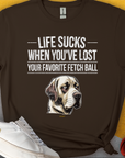 Soft-style cotton blend unisex t-shirt with a sad dog illustration and the quote: Life Sucks When Youve Lost Your Favorite Fetch Ball. Designed by Dog Gang.