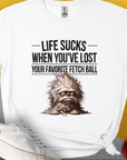 Life Sucks When Youve Lost Your Favorite Fetch Ball, Volume 3 T-shirt features a scruffy dog design and cheeky text, perfect for any dog lover. Designed by Dog Gang.